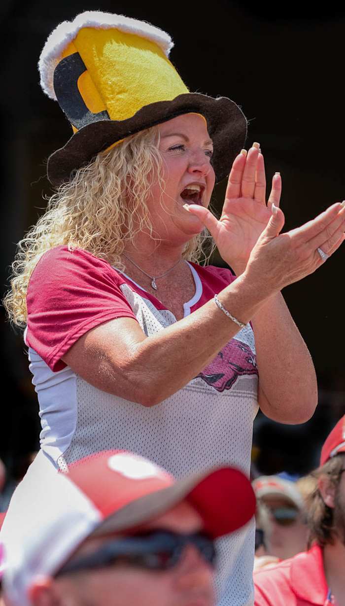 A Razorback fan wears a beer hat signifying the bases are loaded during a 17-2 win over Stanford on Saturday afternoon.